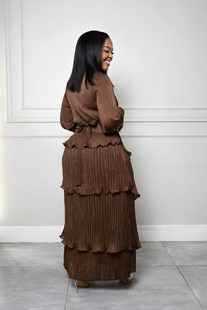 The Plissé Column Dress in brown, side view