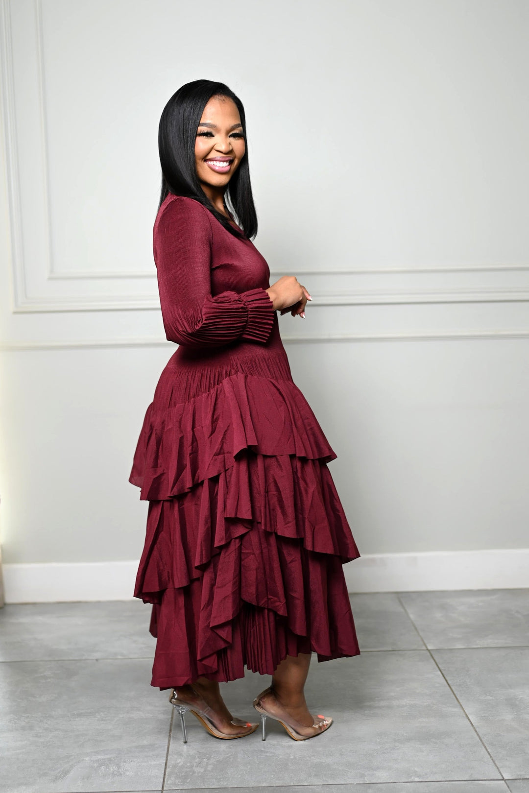 The Merlot Cascade Dress, side view of the tiered ruffle skirt