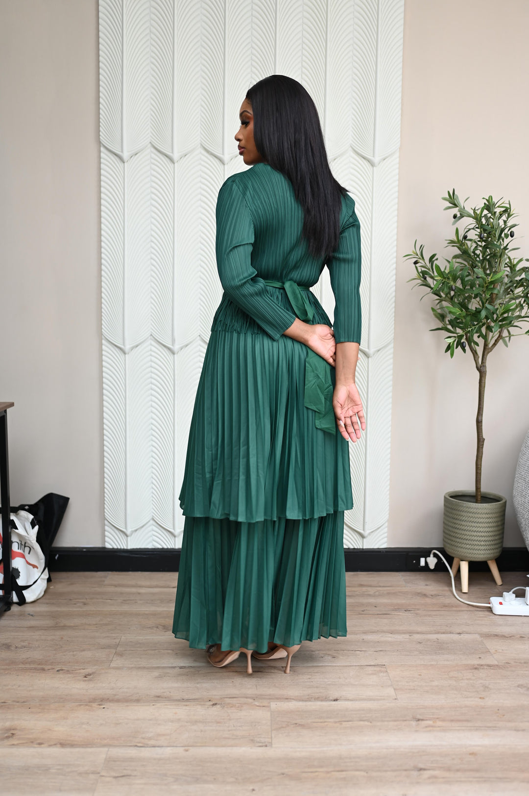 Verdant Whisper Tiered Set in emerald, back view showing tie waist and tiered pleats